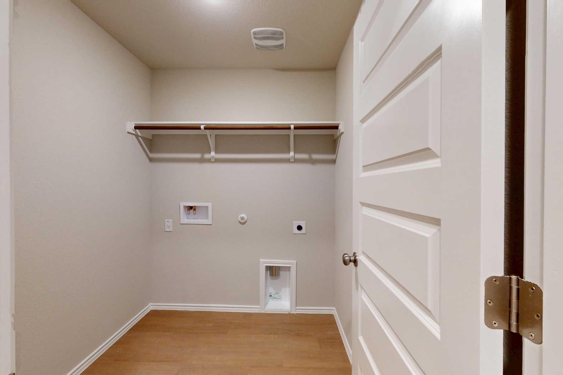 19917 Schatz Way Manor, TX 78653 - Photo 30 of 33 a view of storage and utility room with empty racks