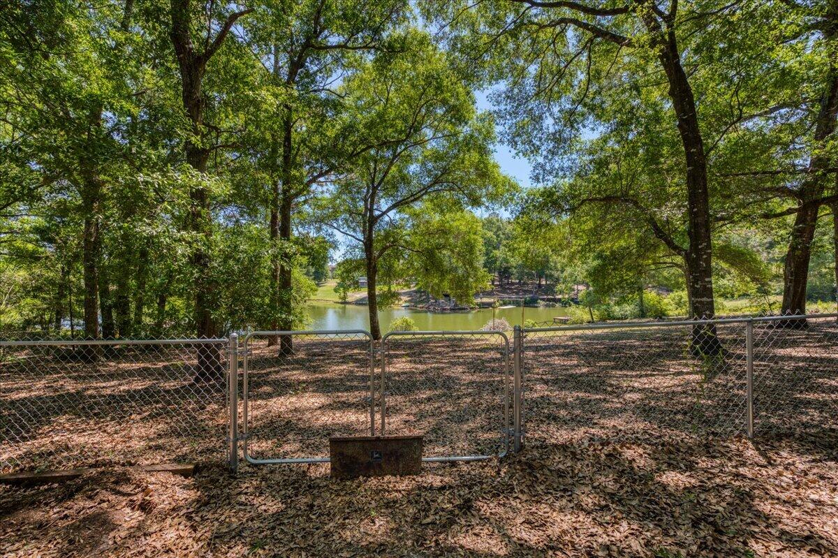 210 Shell Drive Crestview, FL 32536 - Photo 50 of 67 a backyard of water with trees
