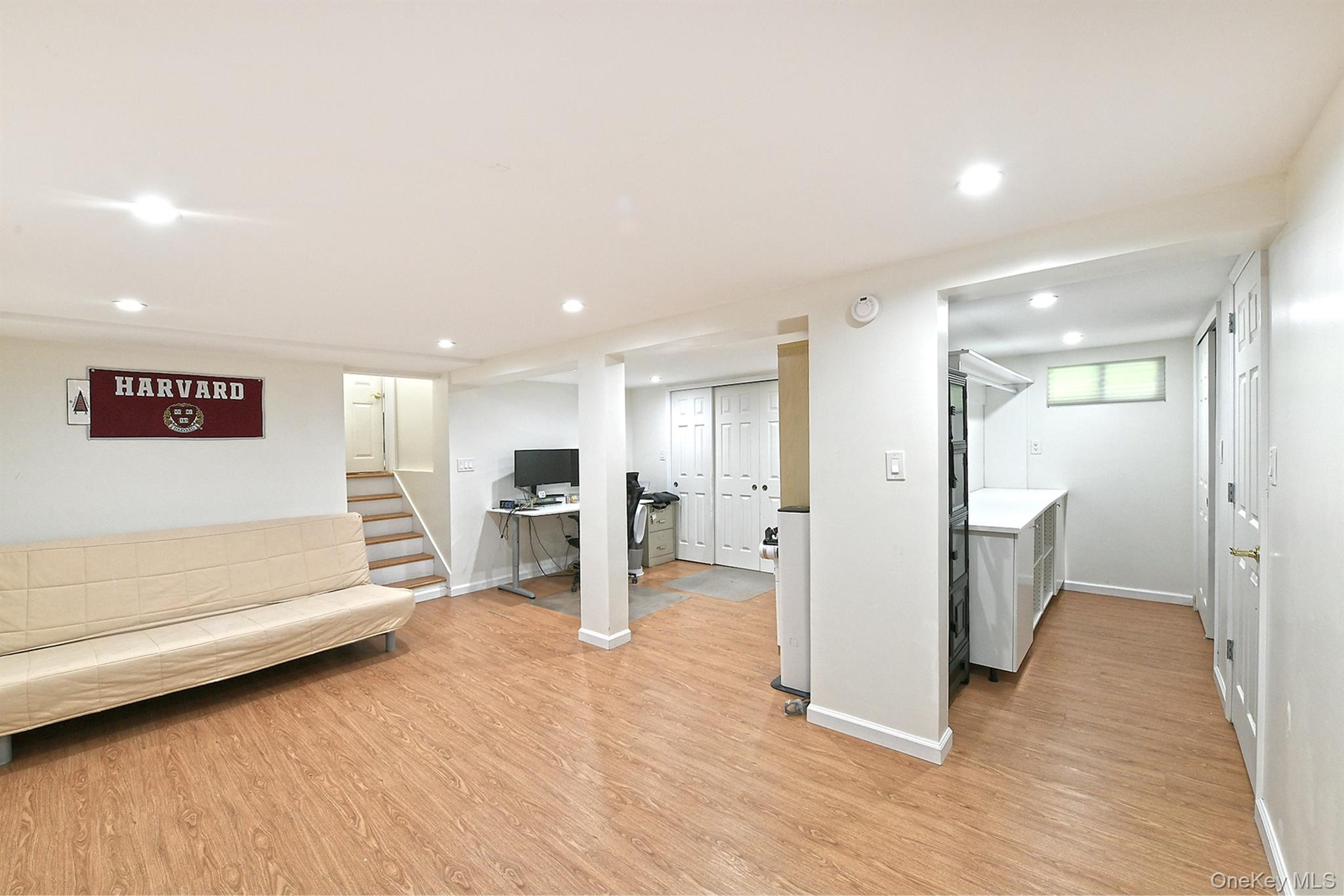 53 Stuart Drive Syosset, NY 11791 - Photo 18 of 24 a view of livingroom with furniture and windows