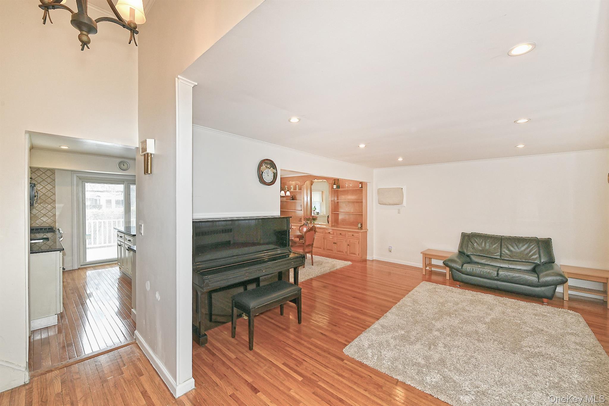 53 Stuart Drive Syosset, NY 11791 - Photo 3 of 24 a living room with furniture and a wooden floor