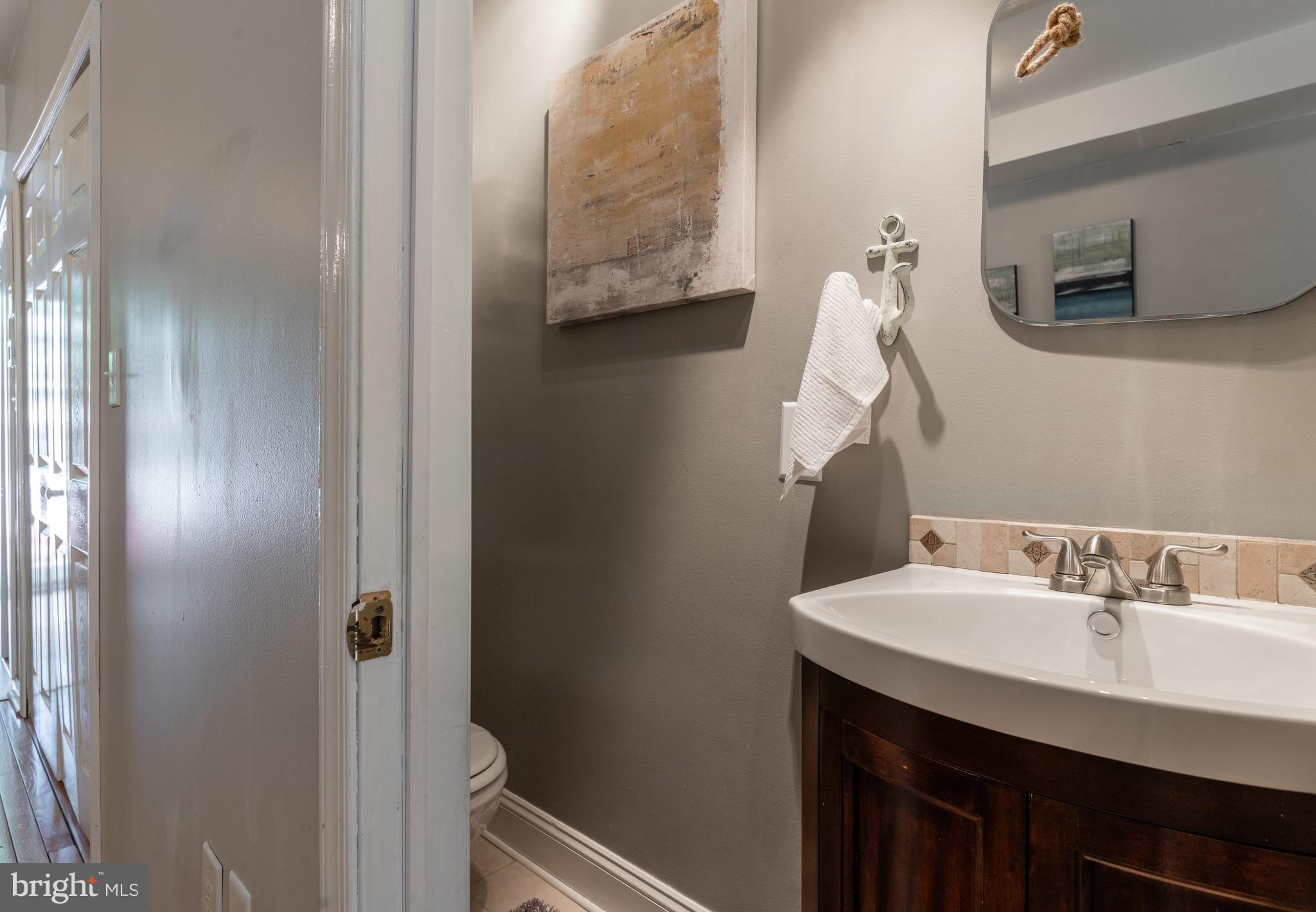 1538 Constitution Avenue Northeast Washington, DC 20002 - Photo 11 of 26 The first floor half bath is perfect for guests!