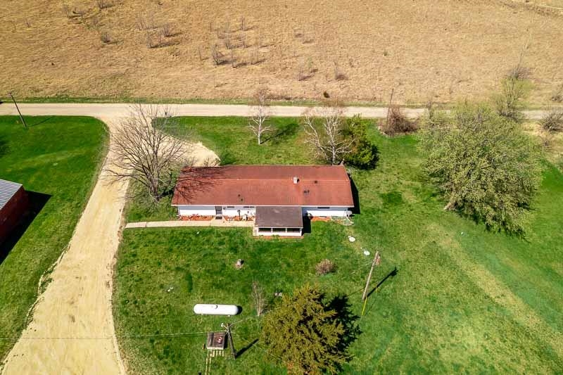17427 West Douglas Road Brodhead, WI 53520 - Photo 28 of 89 an aerial view of residential houses with outdoor space and trees