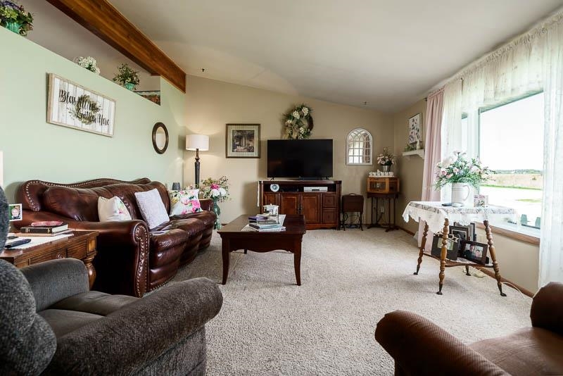 17427 West Douglas Road Brodhead, WI 53520 - Photo 64 of 89 a living room with furniture and a flat screen tv