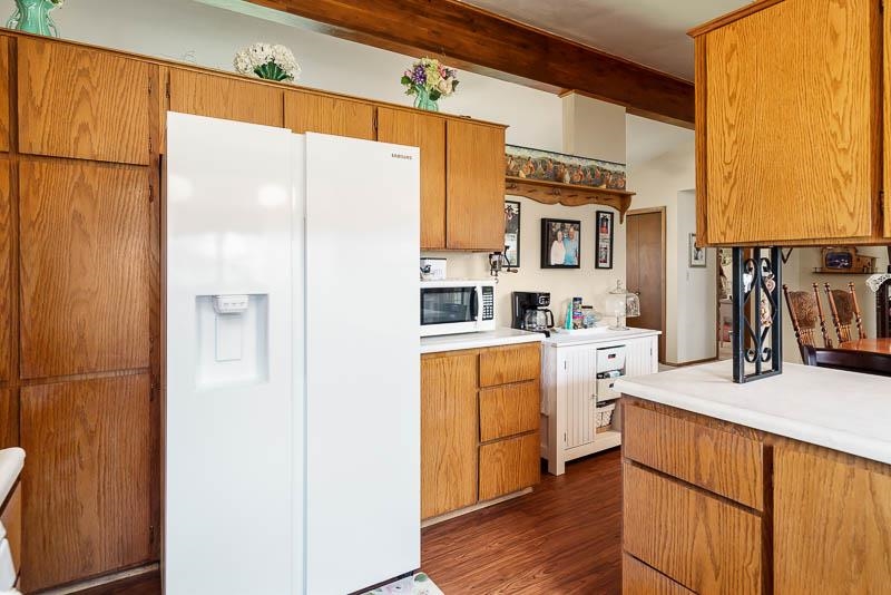 17427 West Douglas Road Brodhead, WI 53520 - Photo 74 of 89 a kitchen with stainless steel appliances a refrigerator and a stove top oven