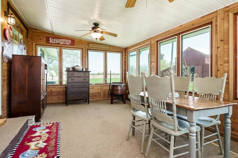 17427 West Douglas Road Brodhead, WI 53520 - Photo 78 of 89 a view of a dining room with furniture window and outside view