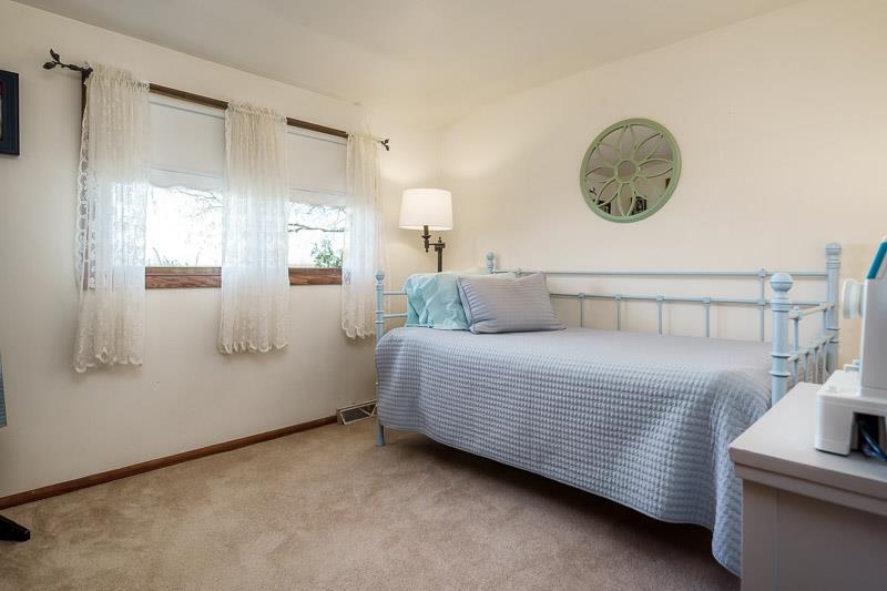 17427 West Douglas Road Brodhead, WI 53520 - Photo 85 of 89 a bedroom with a bed and a window