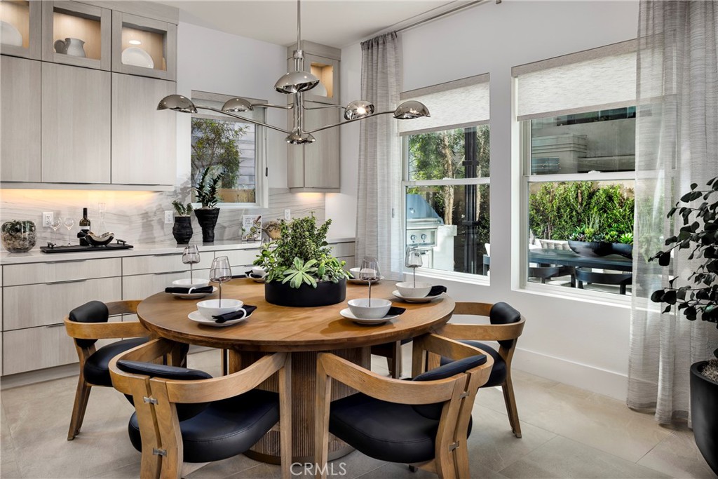 109 Apron Irvine, CA 92618 - Photo 6 of 16 a dining room with furniture and window