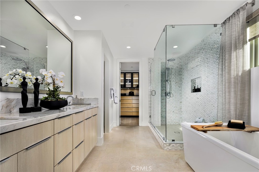 109 Apron Irvine, CA 92618 - Photo 8 of 16 a bathroom with a double vanity sink mirror and shower
