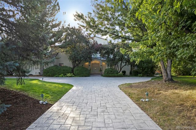 a view of backyard with green space