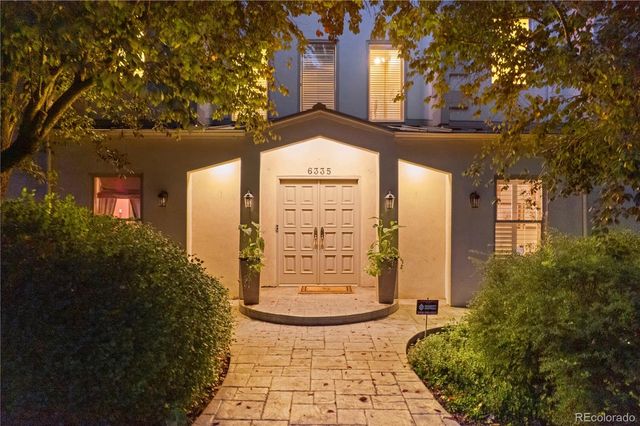 a view of front door with furniture