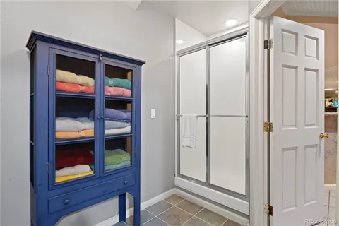 a view of house with deck outdoor seating and barbeque