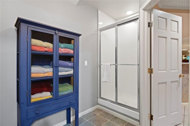 a view of house with deck outdoor seating and barbeque