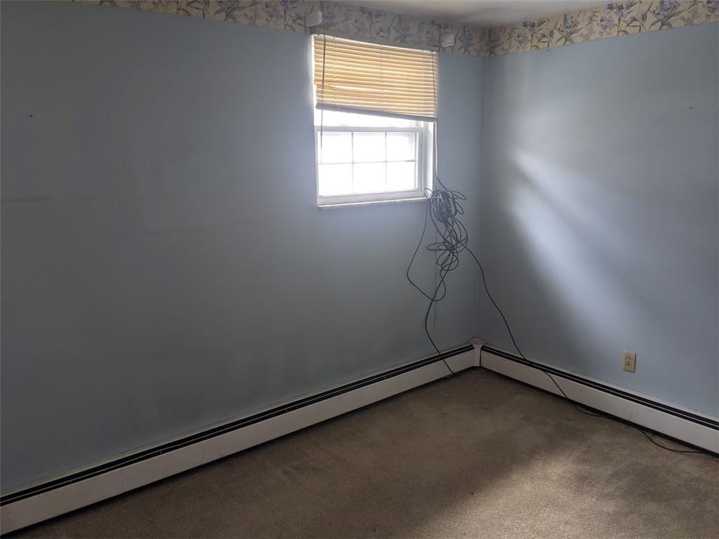 9870 Bellcrest Road Pittsburgh, PA 15237 - Photo 14 of 17 an empty room with a window