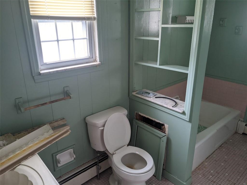 9870 Bellcrest Road Pittsburgh, PA 15237 - Photo 15 of 17 a bathroom with a toilet a sink and a window