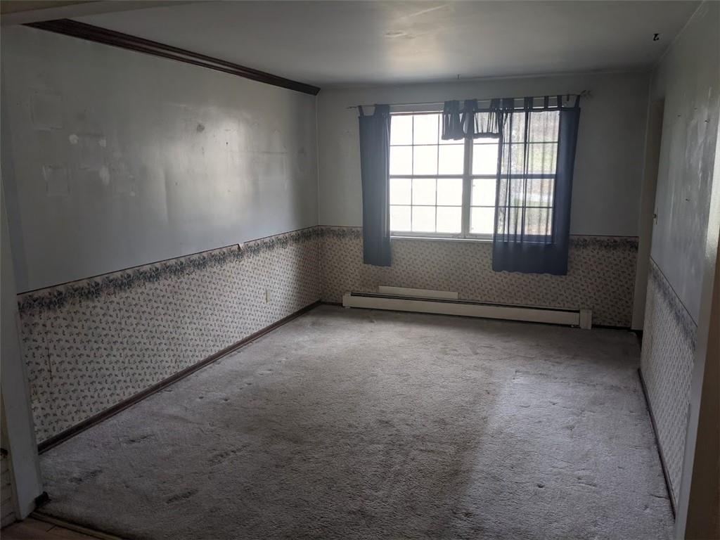 9870 Bellcrest Road Pittsburgh, PA 15237 - Photo 8 of 17 an empty room with windows