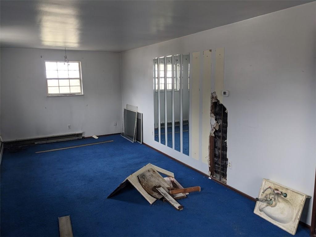 9870 Bellcrest Road Pittsburgh, PA 15237 - Photo 9 of 17 a room with furniture and wooden floor