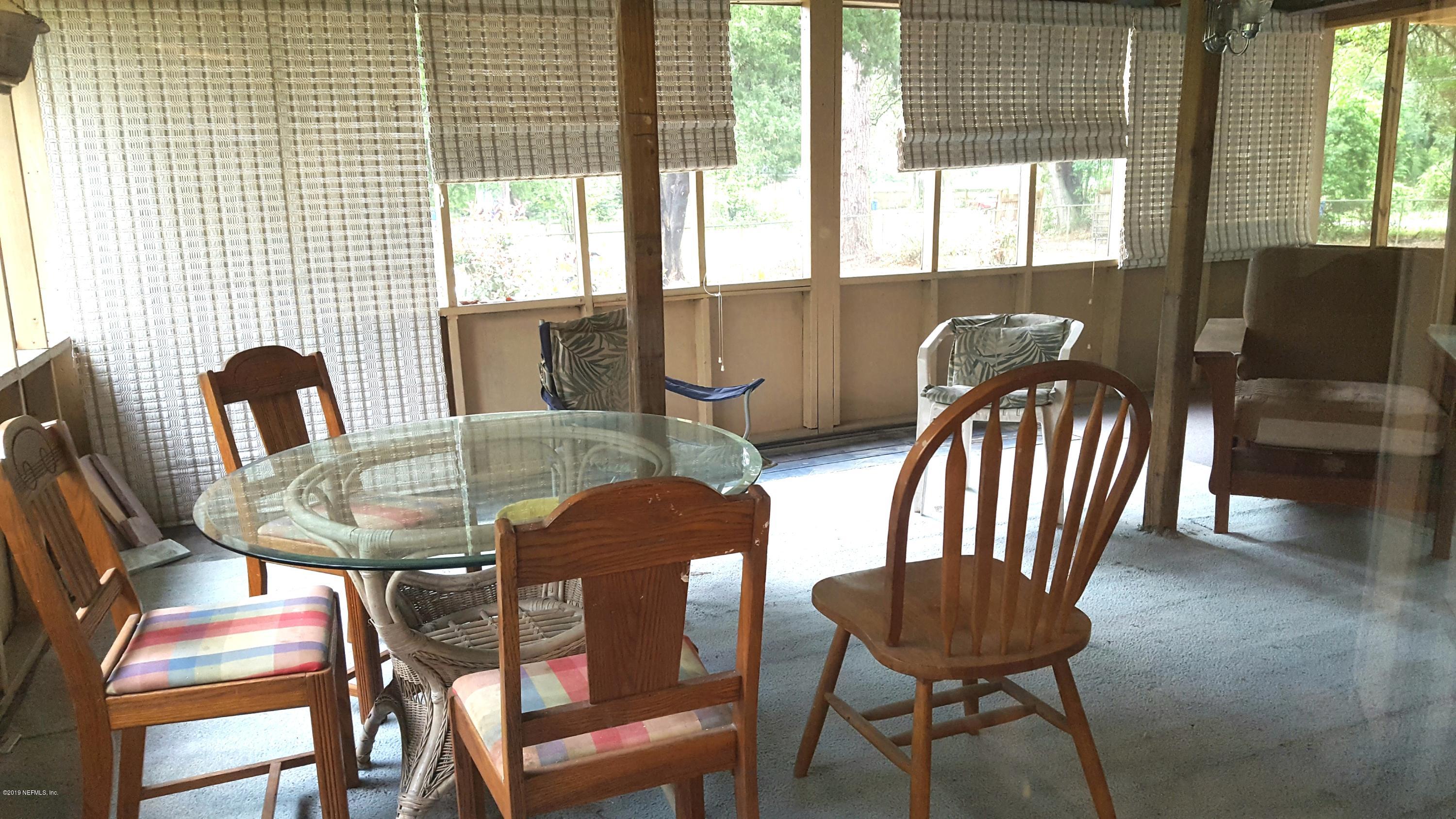 11352 Guinn Road Jacksonville, FL 32218 - Photo 2 of 26 Enclosed Screen In Wooden Deck