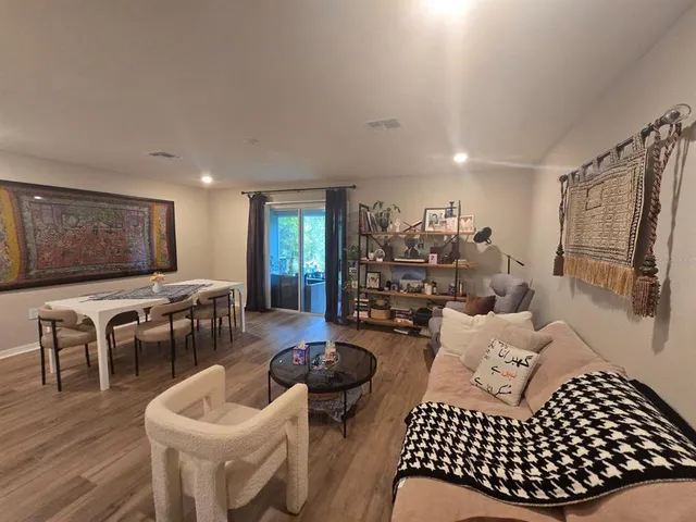 a dinning table and chairs in a room