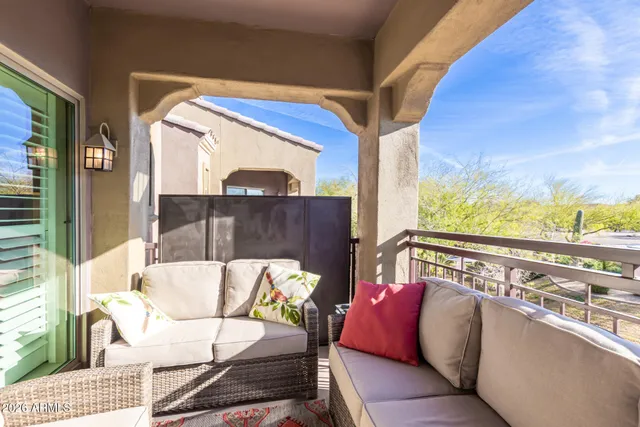 a balcony with furniture