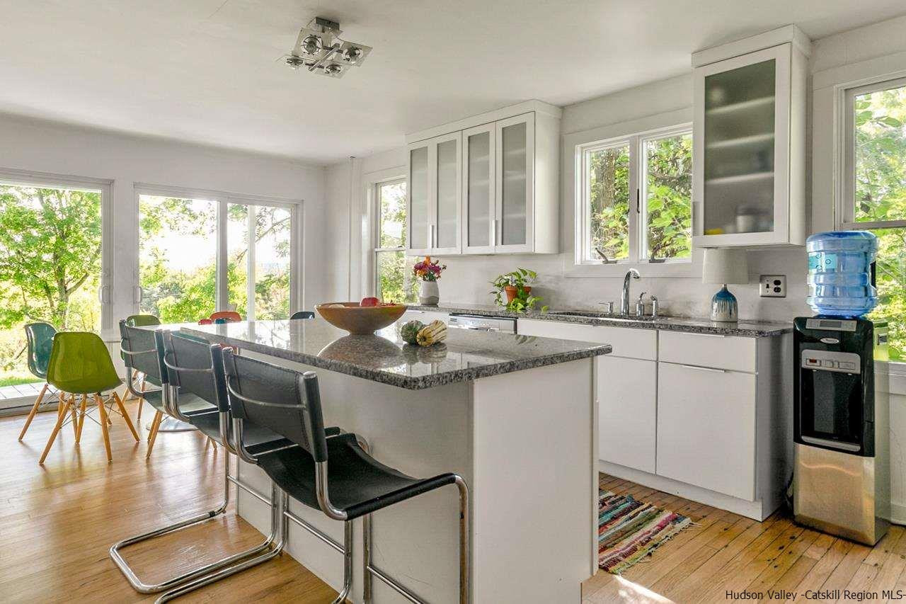 807 Leeds Athens Road Athens, NY 12015 - Photo 13 of 29 a kitchen with a counter top space appliances and a large window
