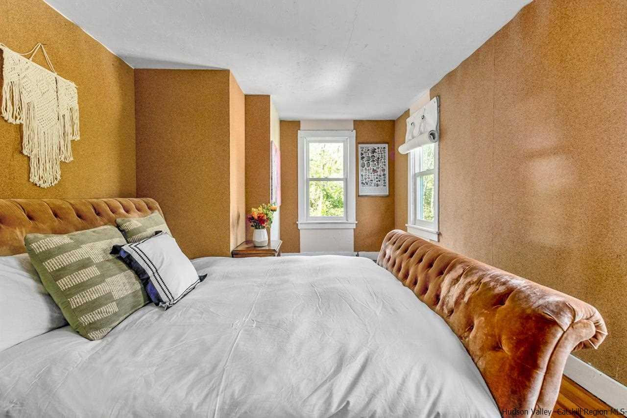 807 Leeds Athens Road Athens, NY 12015 - Photo 15 of 29 a bedroom with a bed and a window