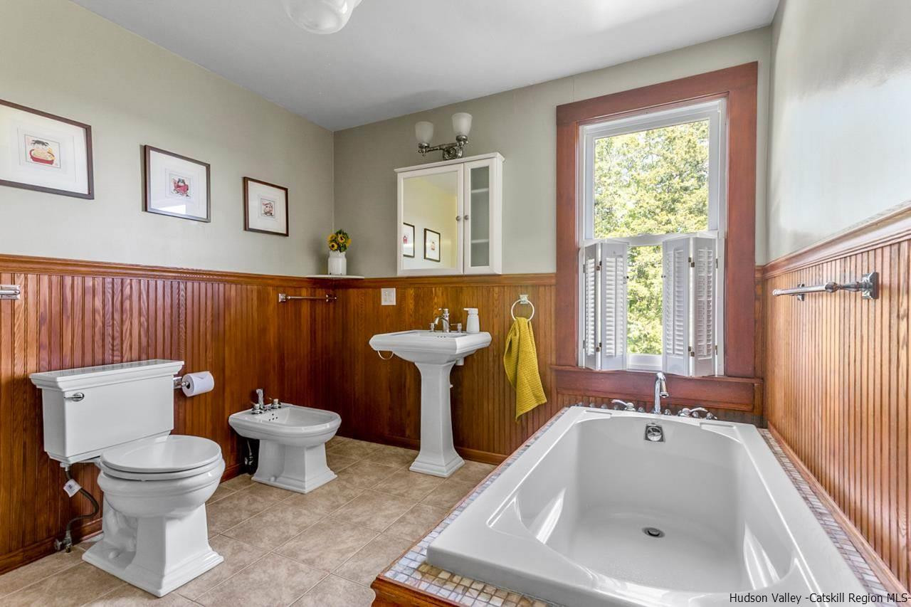 807 Leeds Athens Road Athens, NY 12015 - Photo 16 of 29 a bathroom with a sink toilet and bathtub