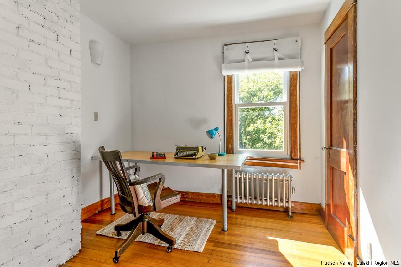 807 Leeds Athens Road Athens, NY 12015 - Photo 20 of 29 a view of a workspace with wooden floor and a window