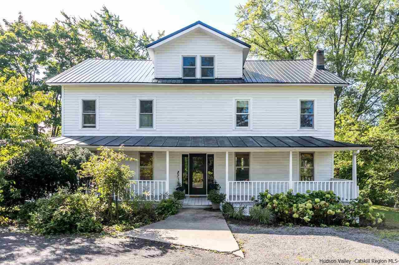 807 Leeds Athens Road Athens, NY 12015 - Photo 2 of 29 a front view of a house with garden