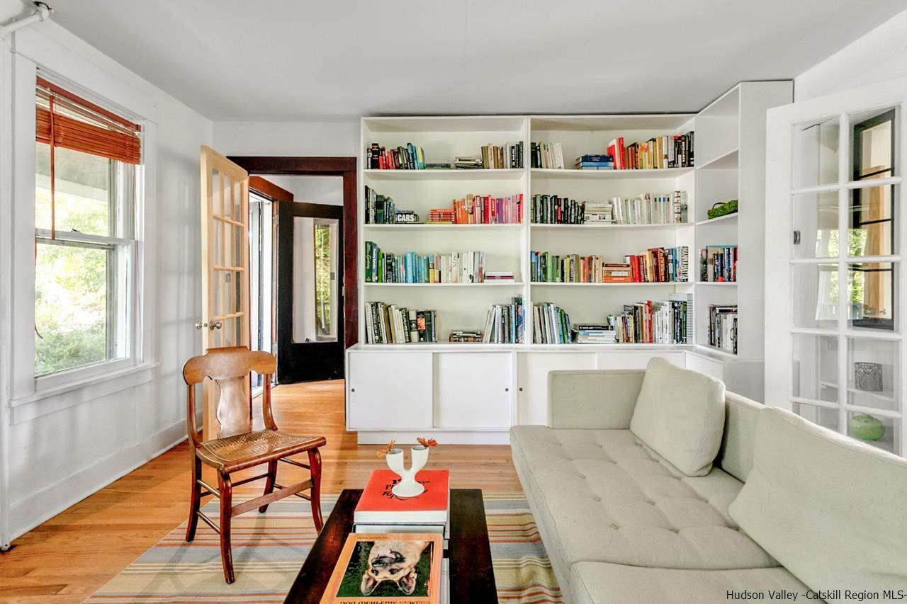807 Leeds Athens Road Athens, NY 12015 - Photo 6 of 29 a living room with furniture and a window