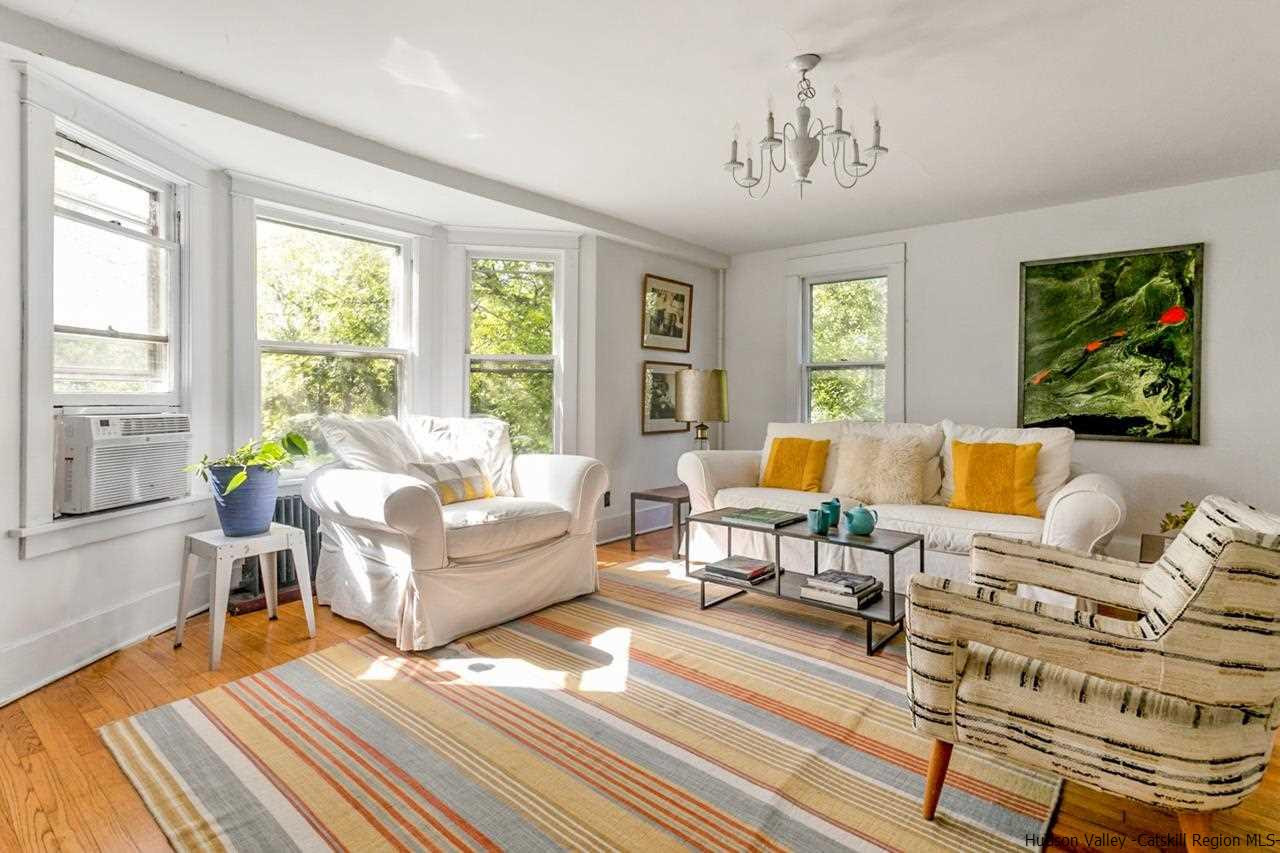807 Leeds Athens Road Athens, NY 12015 - Photo 10 of 29 a living room with furniture and a large window