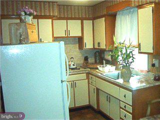 9050 Convent Avenue Philadelphia, PA 19136 - Photo 3 of 5 a kitchen with a sink and a window
