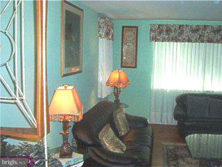 9050 Convent Avenue Philadelphia, PA 19136 - Photo 5 of 5 a living room with furniture and a window