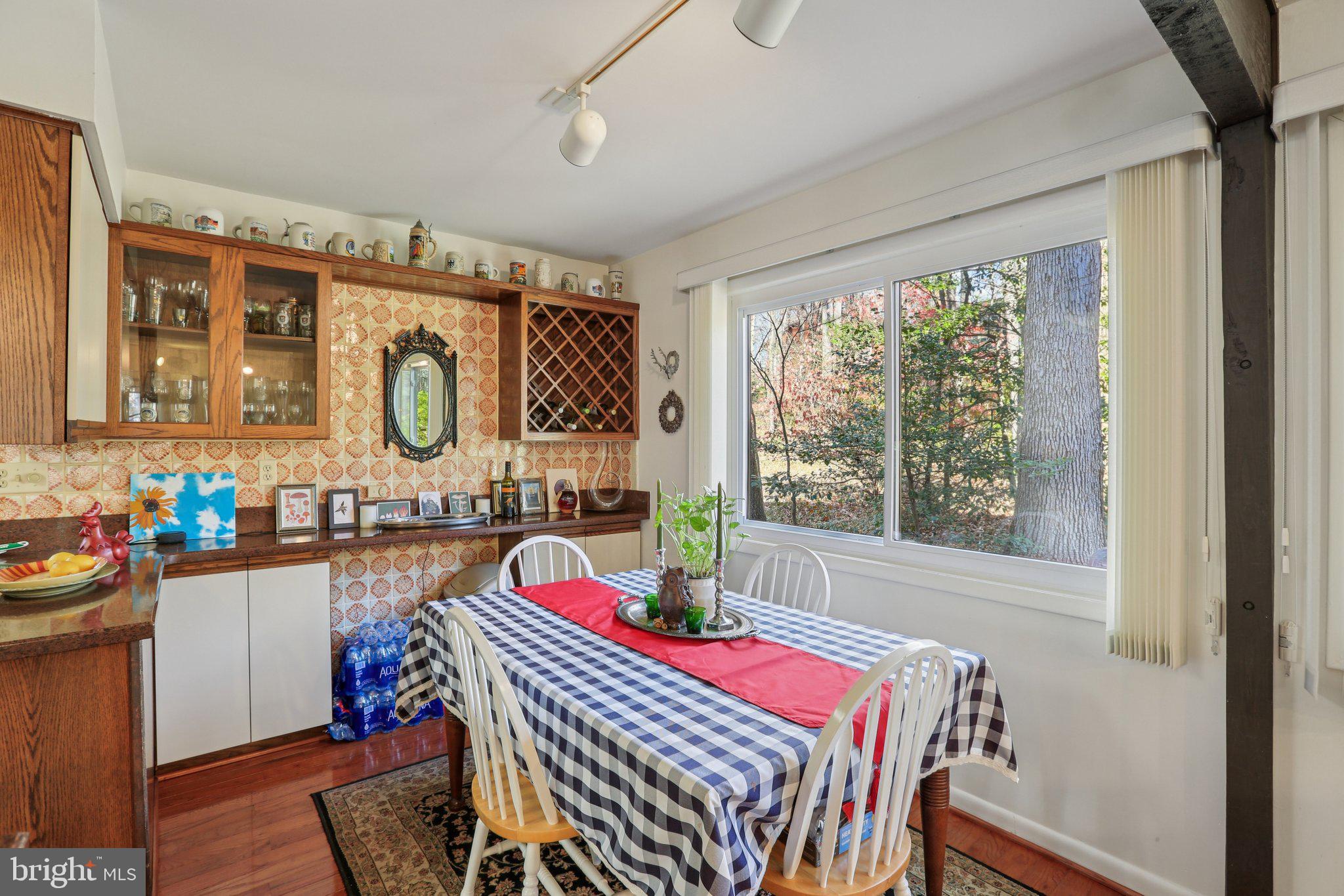 10968 Swansfield Road Columbia, MD 21044 - Photo 17 of 57 a view of a kitchen and dining room