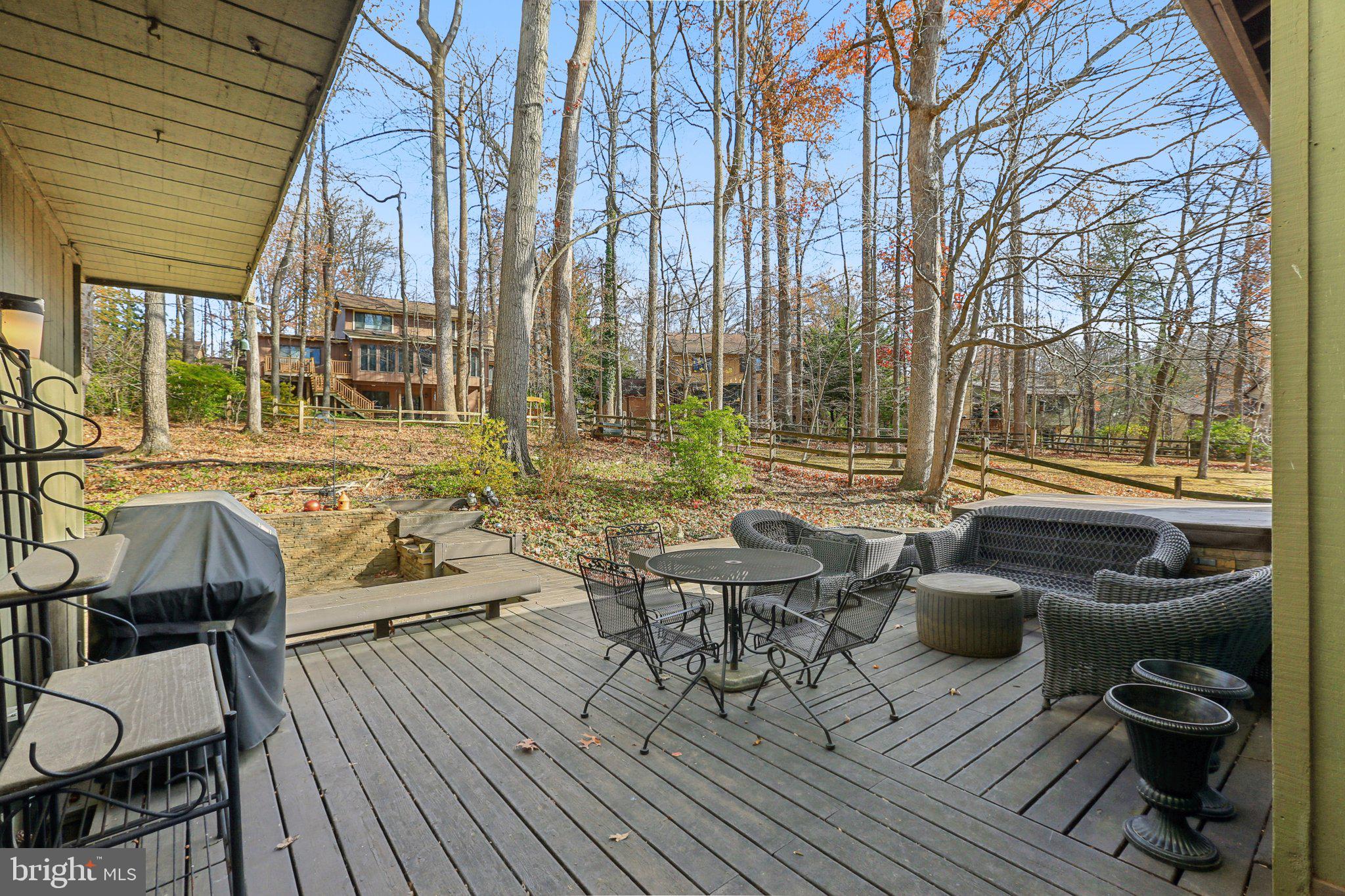 10968 Swansfield Road Columbia, MD 21044 - Photo 46 of 57 a backyard of a house with outdoor seating
