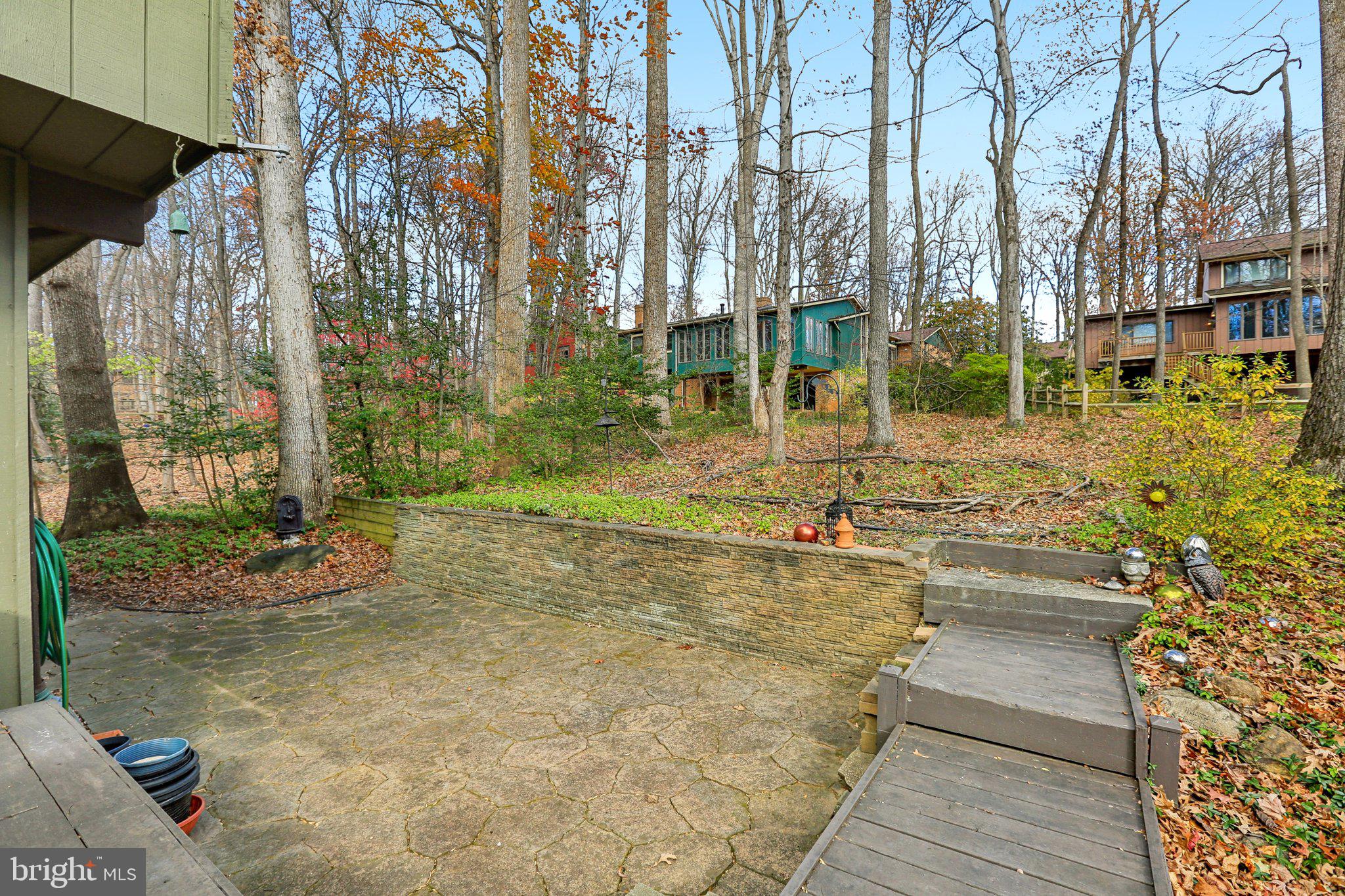 10968 Swansfield Road Columbia, MD 21044 - Photo 47 of 57 a view of a backyard with large trees