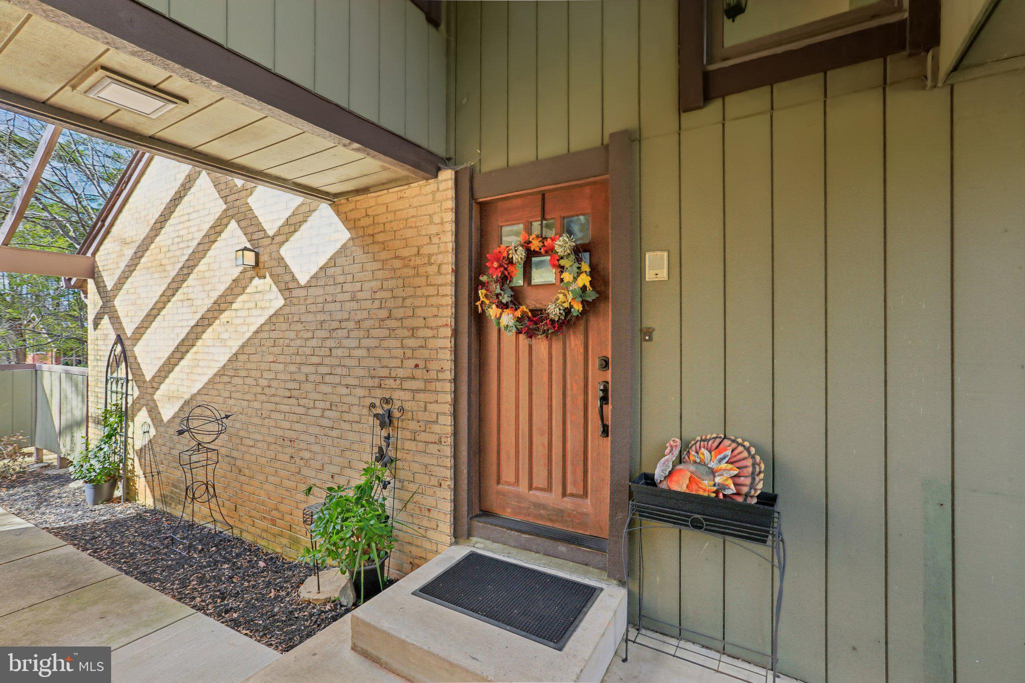 10968 Swansfield Road Columbia, MD 21044 - Photo 6 of 57 a view of a entryway door of the house