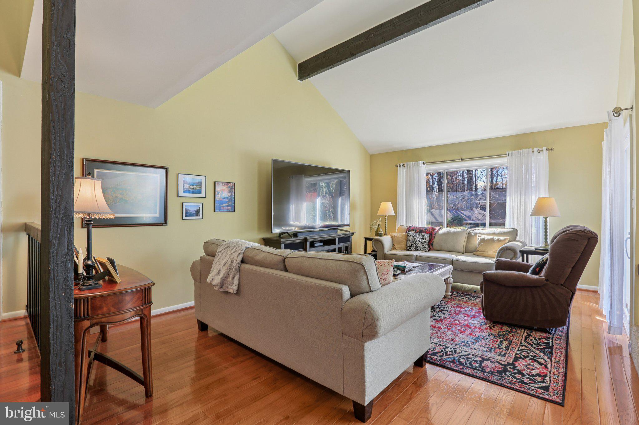 10968 Swansfield Road Columbia, MD 21044 - Photo 9 of 57 a living room with furniture and a window