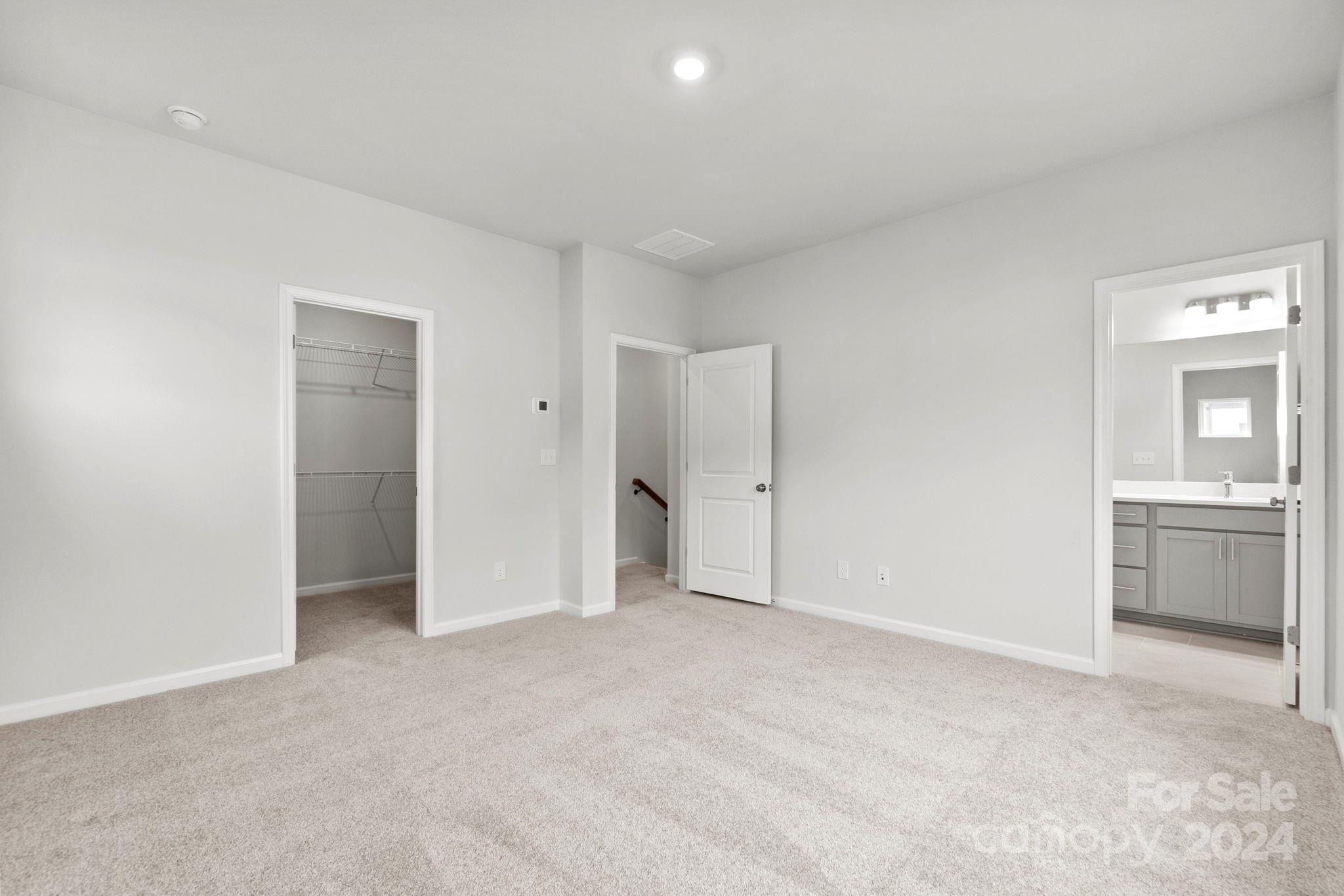 1702 Blanche Street Albemarle, NC 28001 - Photo 11 of 29 a view of an empty room and a kitchen