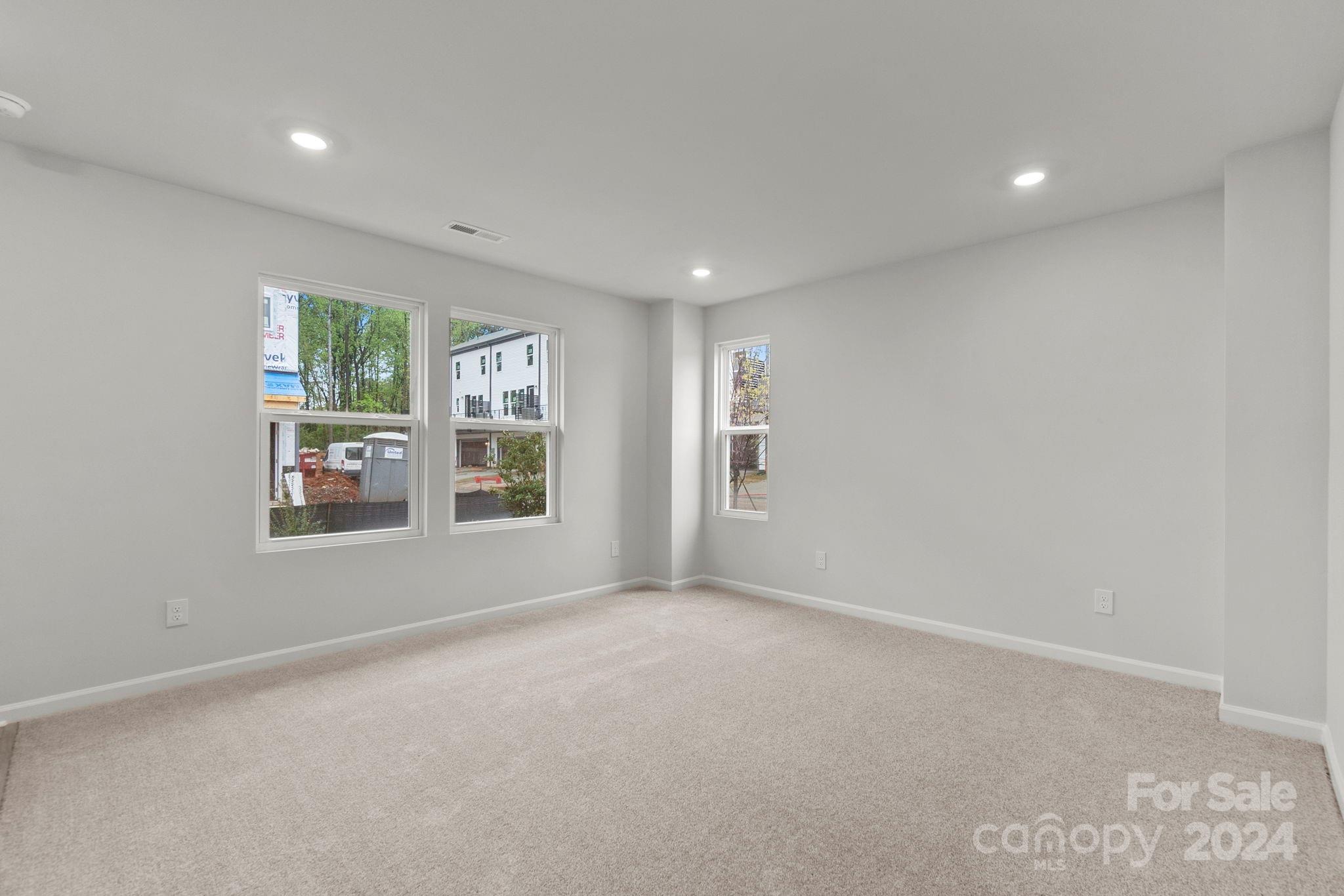 1702 Blanche Street Albemarle, NC 28001 - Photo 20 of 29 an empty room with windows