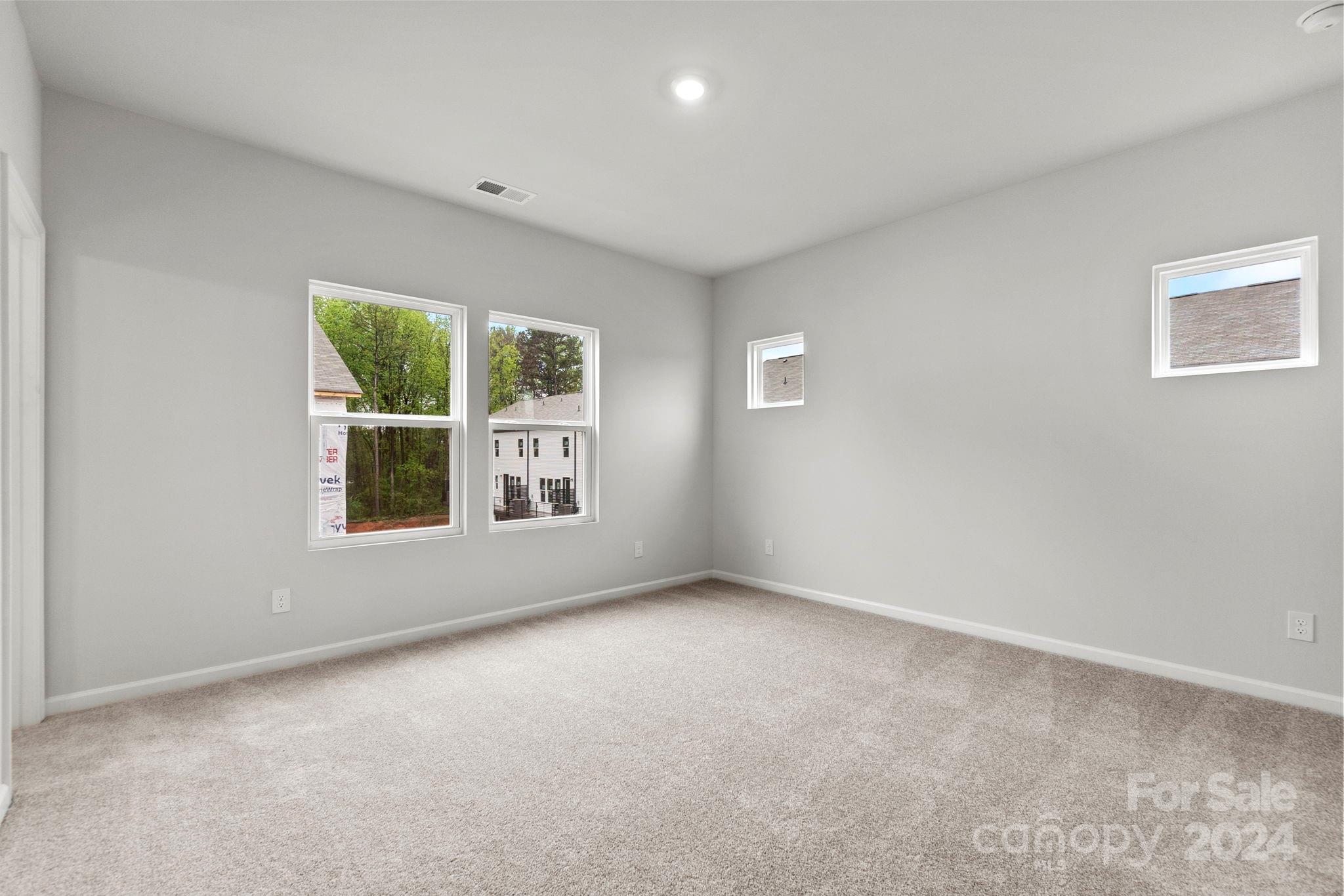 1702 Blanche Street Albemarle, NC 28001 - Photo 10 of 29 a view of an empty room with a window