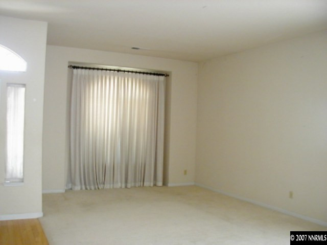 1134 University Ridge Drive Reno, NV 89512 - Photo 5 of 9 an empty room with window