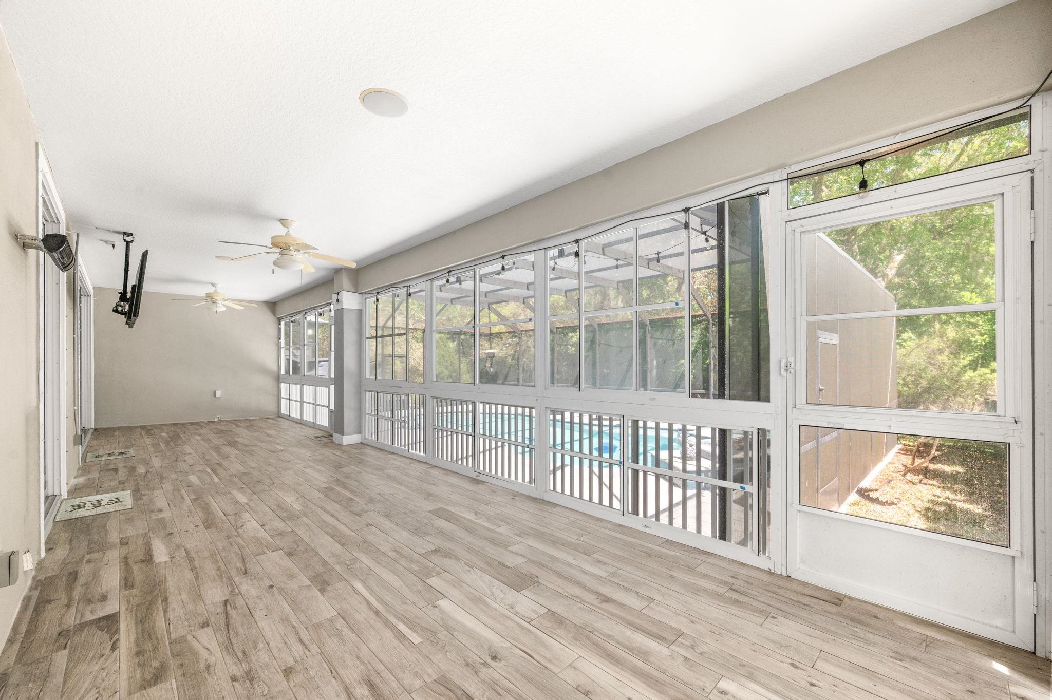 1184 Overdale Road St. Augustine, FL 32080 - Photo 20 of 75 Unfurnished sunroom featuring a ceiling fan