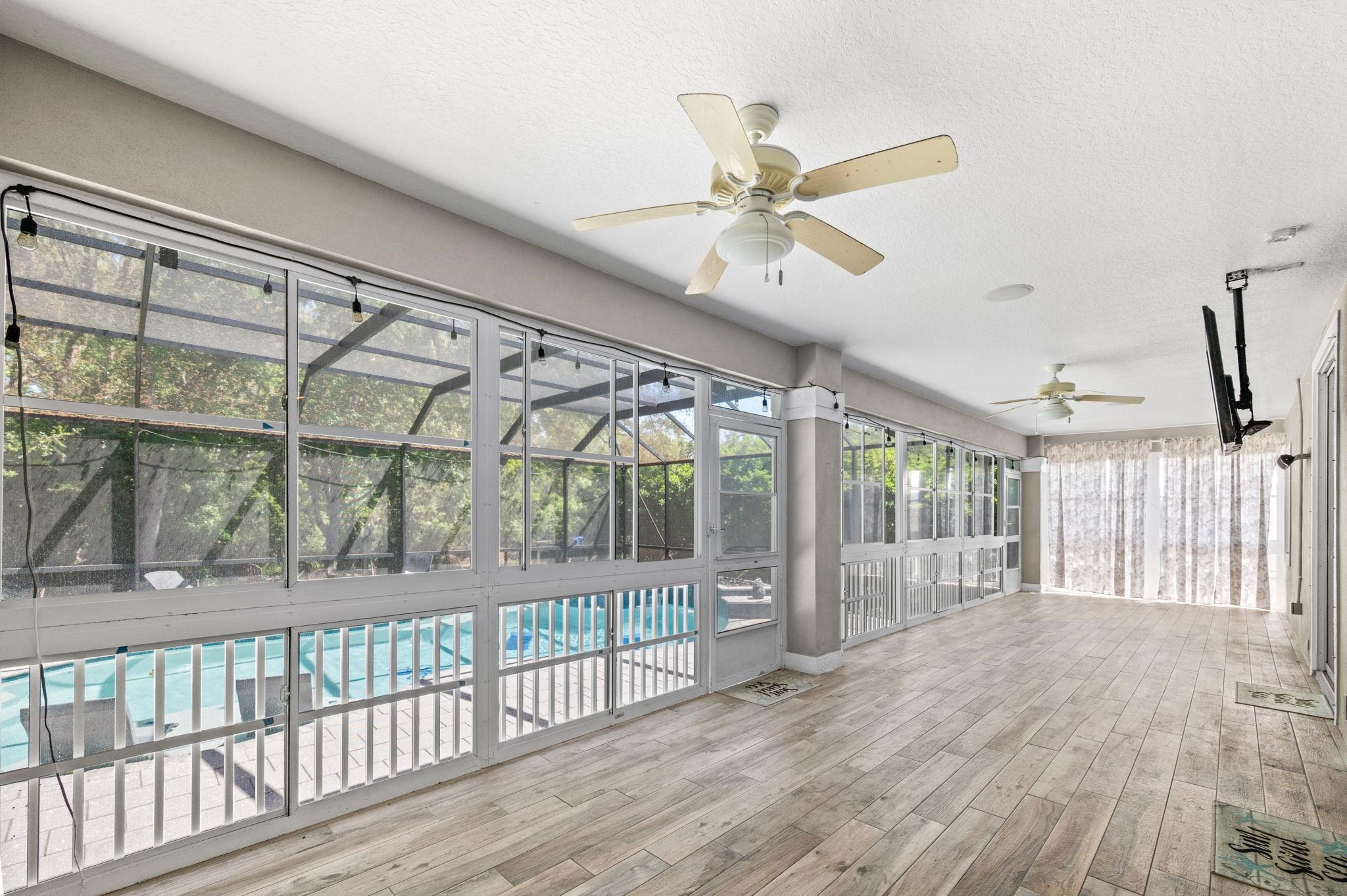 1184 Overdale Road St. Augustine, FL 32080 - Photo 21 of 75 Unfurnished sunroom featuring a ceiling fan