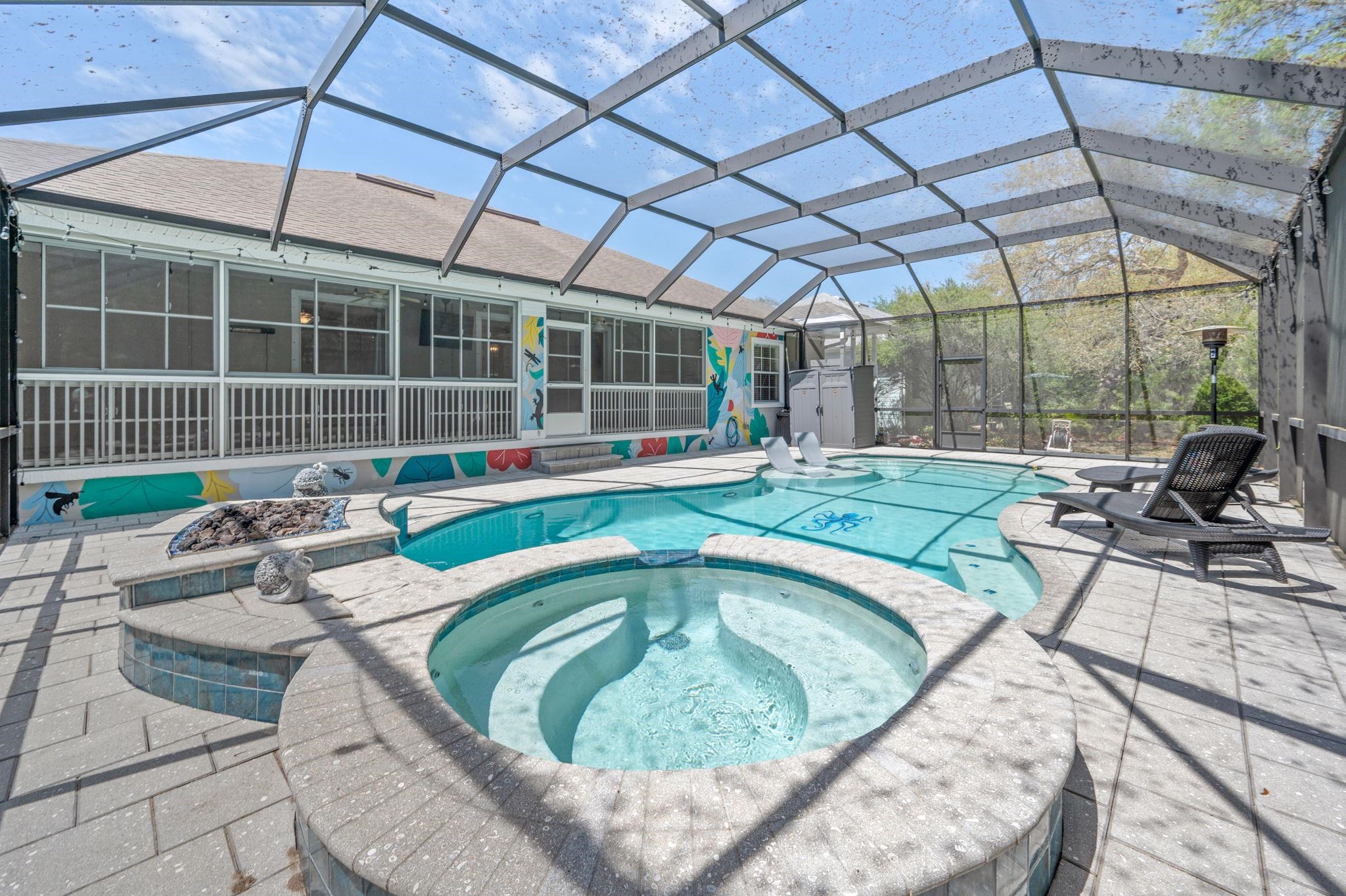 1184 Overdale Road St. Augustine, FL 32080 - Photo 24 of 75 Combined pool / hot tub featuring a sunroom, a patio, and glass enclosure