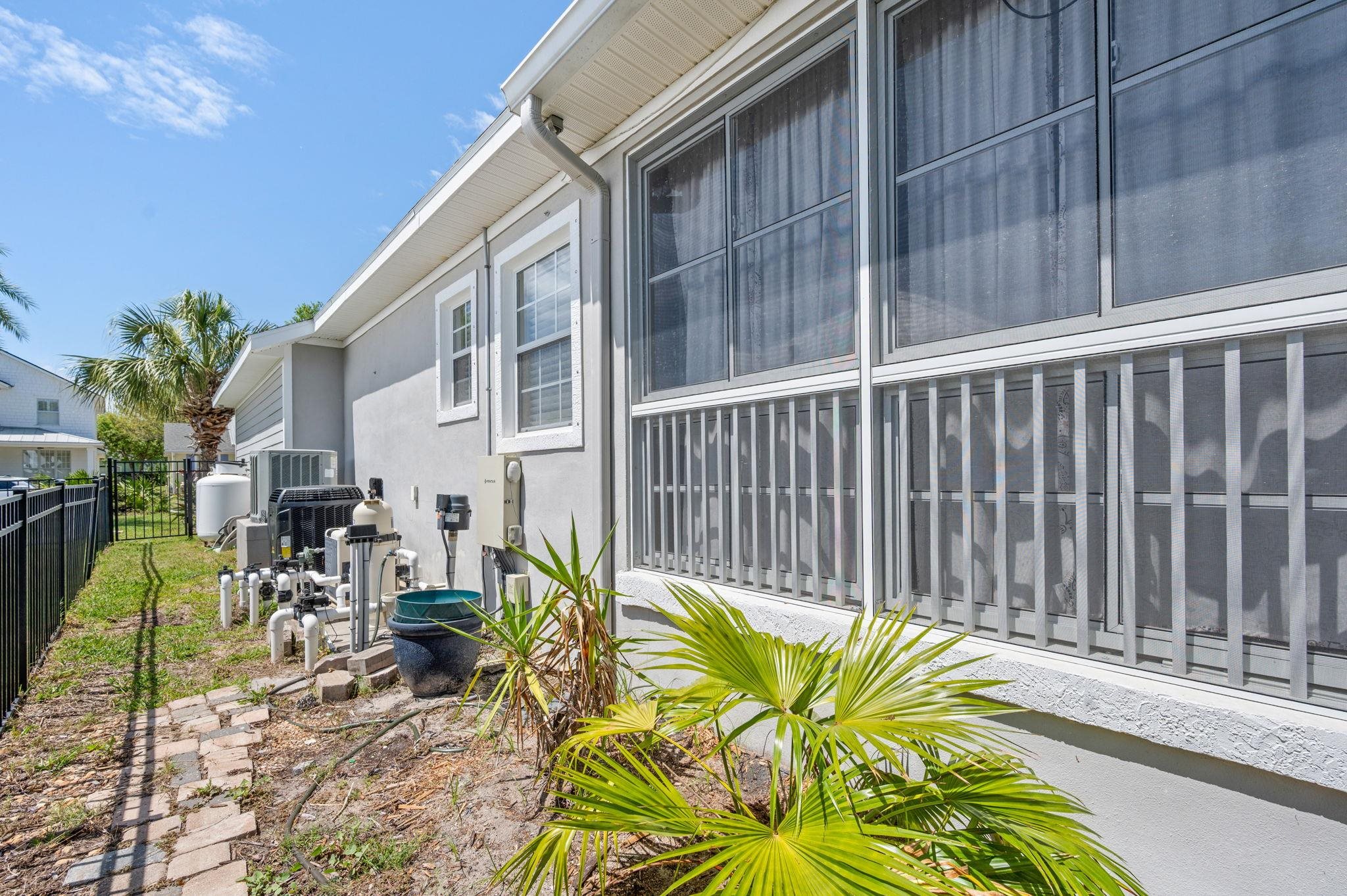 1184 Overdale Road St. Augustine, FL 32080 - Photo 32 of 75 View of property exterior featuring stucco siding and a patio area