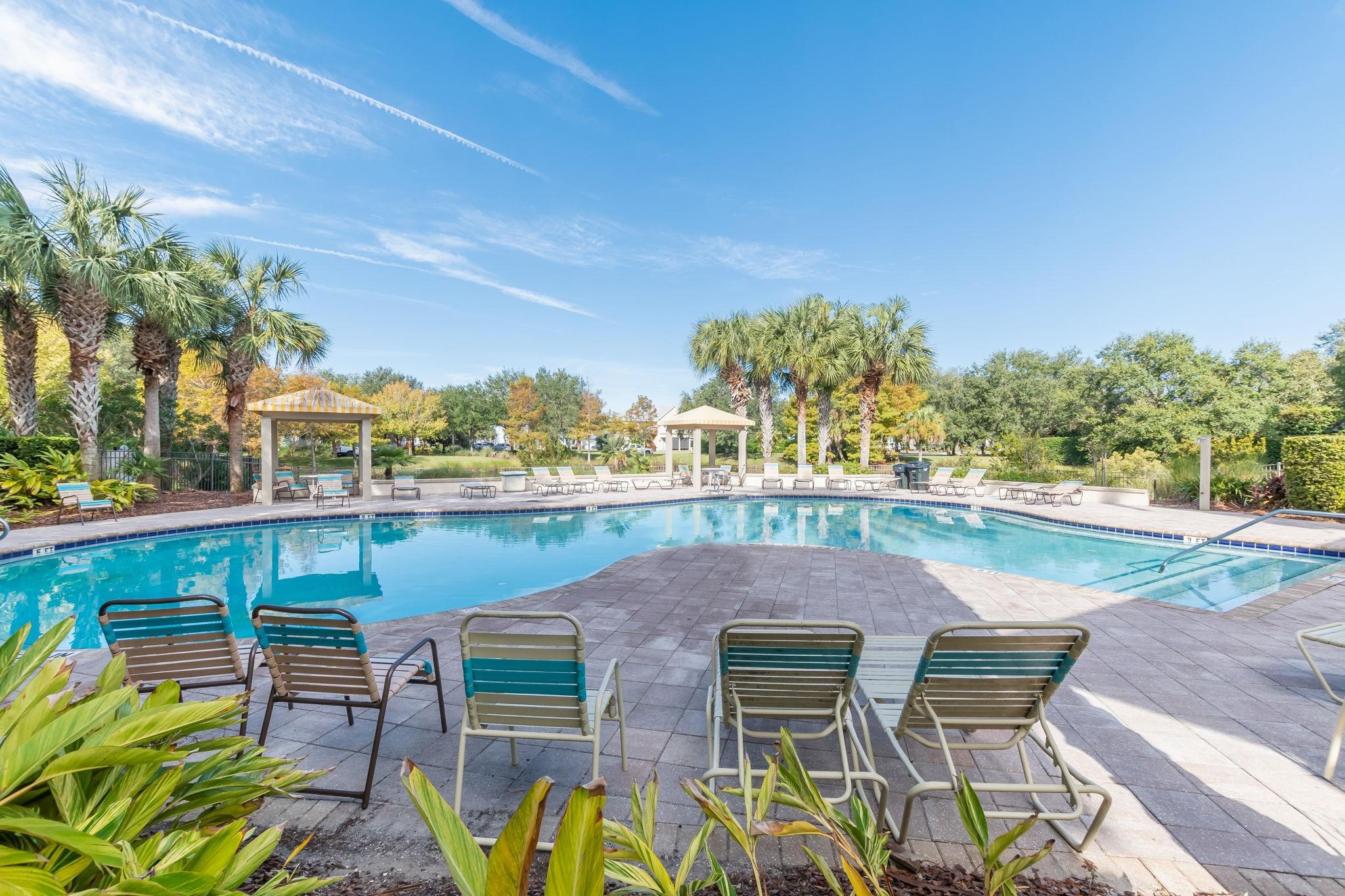 1184 Overdale Road St. Augustine, FL 32080 - Photo 35 of 75 Community pool featuring a gazebo, a patio area, and view of scattered trees