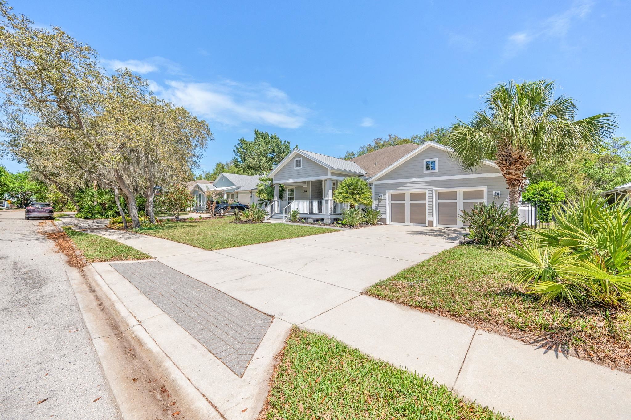 1184 Overdale Road St. Augustine, FL 32080 - Photo 45 of 75 View of front facade featuring a front yard, driveway, and covered porch