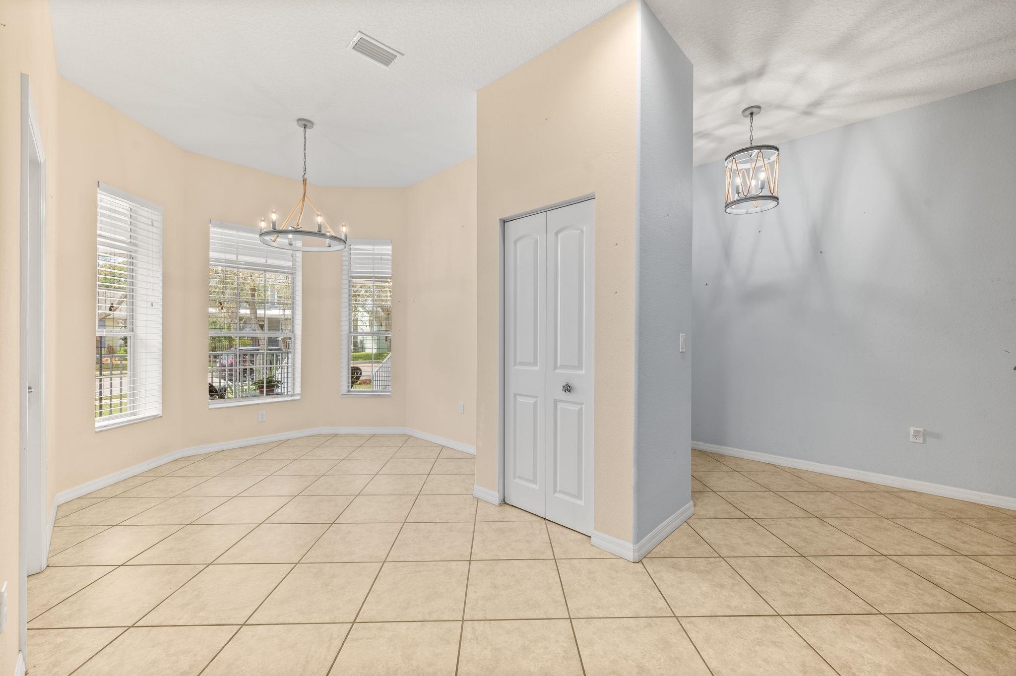 1184 Overdale Road St. Augustine, FL 32080 - Photo 5 of 75 Unfurnished dining area featuring suspended lighting and light tile patterned floors
