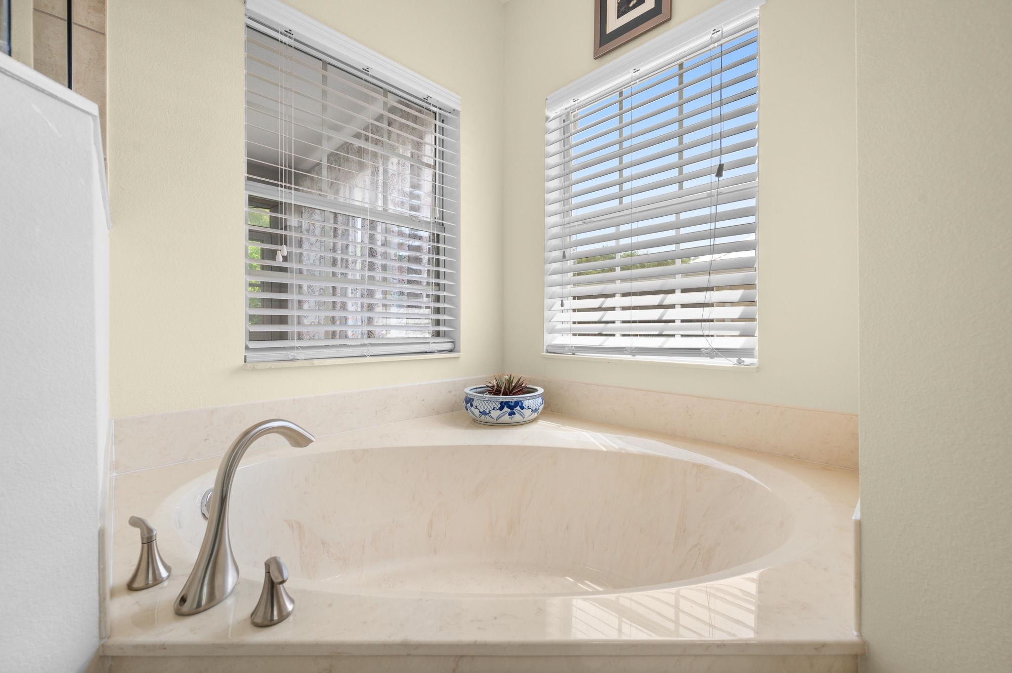 1184 Overdale Road St. Augustine, FL 32080 - Photo 56 of 75 Bathroom with plenty of natural light and a garden tub