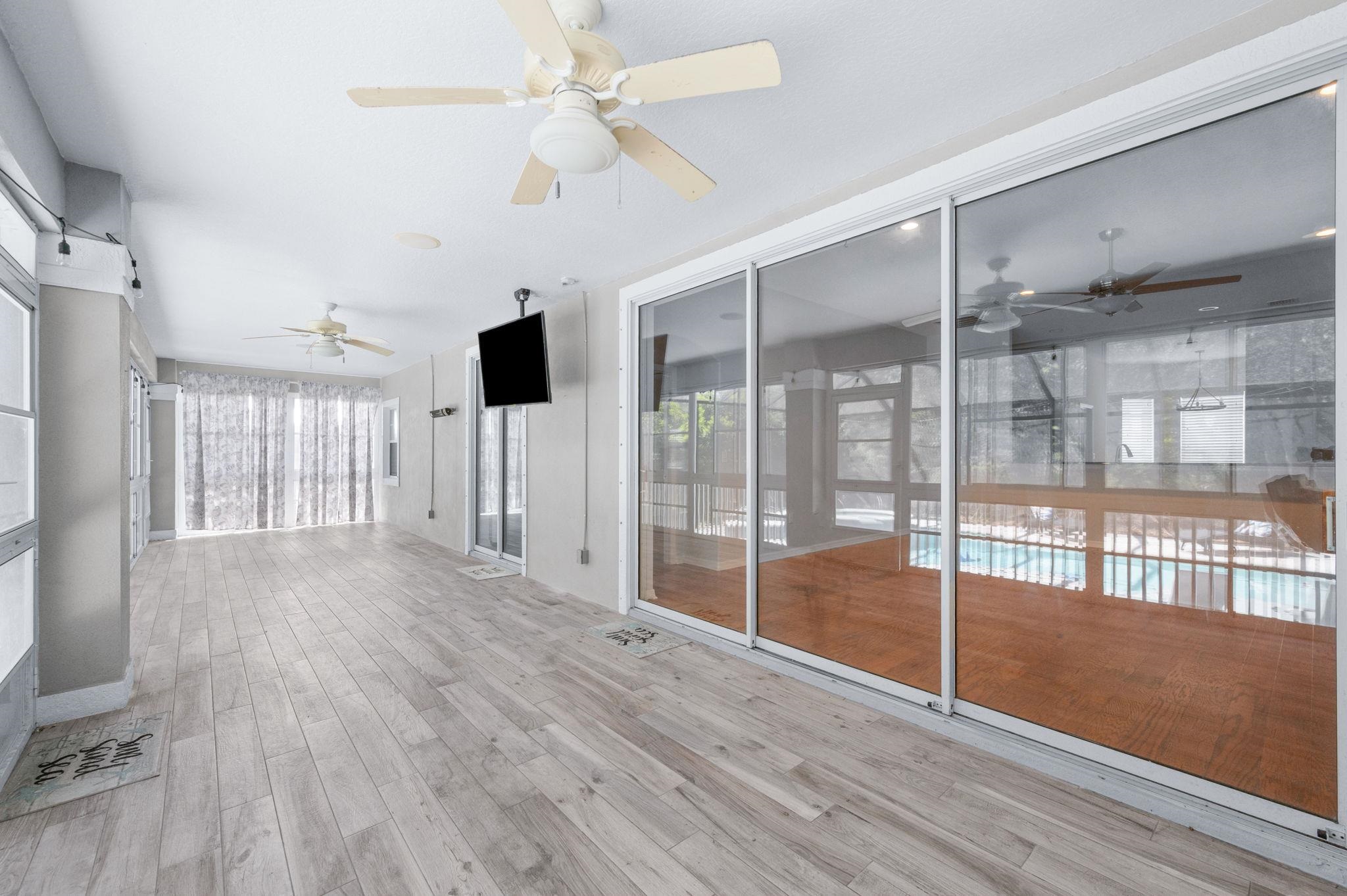 1184 Overdale Road St. Augustine, FL 32080 - Photo 60 of 75 Unfurnished sunroom with ceiling fan